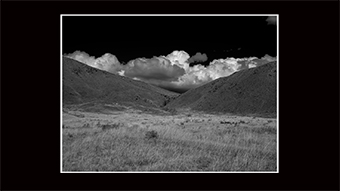 The Richard Philip Soltice Gallery - Dry Grass, Bare Hills and Approaching Clouds