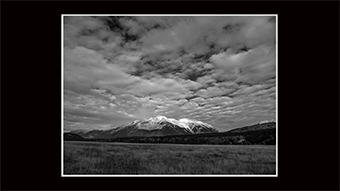 The Richard Philip Soltice Gallery - Field, Hills and New Snow Clouds